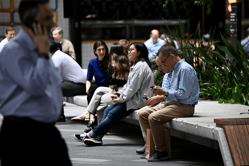 Office workers are seen in Sydney. Photo: AAP Image/Bianca De Marchi
